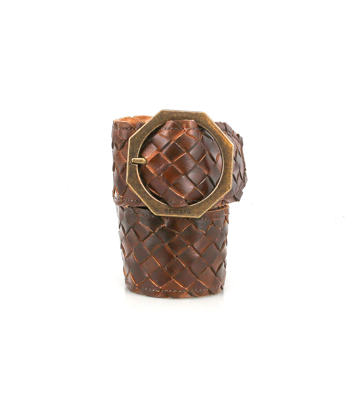 The Dreamweaver by Bed Stu is a wide brown woven leather cuff bracelet, featuring a statement metal buckle and a bold octagonal brass accent inspired by vintage boho belt designs.