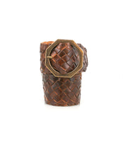 The Dreamweaver by Bed Stu is a wide brown woven leather cuff bracelet, featuring a statement metal buckle and a bold octagonal brass accent inspired by vintage boho belt designs.