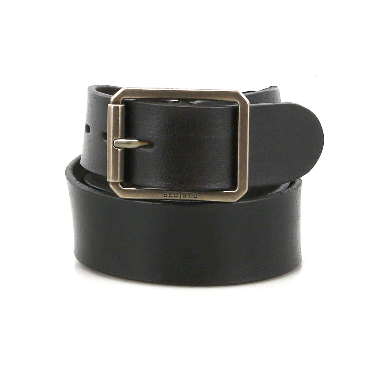 The Drifter belt by Bed Stu is a black leather accessory with a rectangular silver buckle, coiled neatly on a white background—an ideal choice for weekend wear.