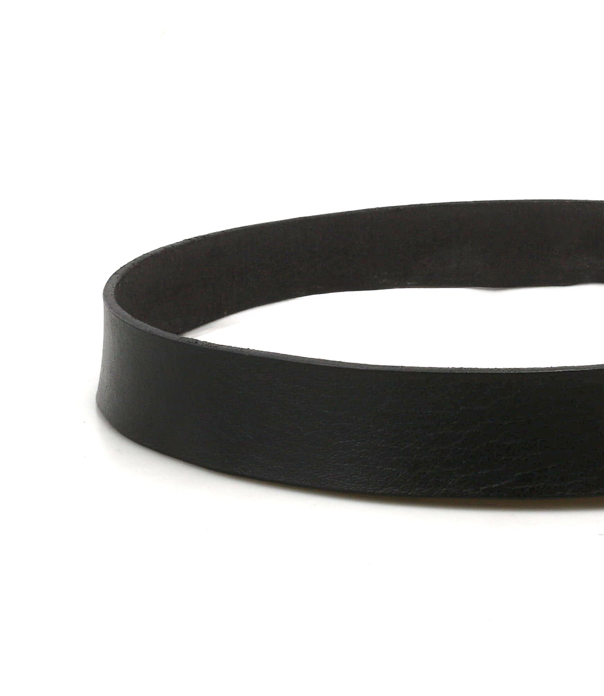 A close-up of the Drifter belt by Bed Stu, its black leather looped into a circle on a white background—a perfect weekend accessory.