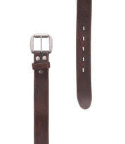 The Bed Stu Drifter is a brown leather belt with a silver buckle and metal rivets, pictured flat with the buckle on the left and holes on the right—ideal for adding dapper appeal to any outfit.