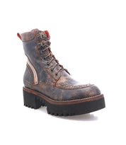 The Bed|Stü Elisha Hi is a brown leather lace-up boot featuring a rugged treaded sole, side zipper, decorative stitching, and a distressed finish, shown against a white background.