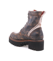 The Elisha Hi by Bed|Stü is a single vintage-inspired lace-up leather boot, displayed from a rear angle on a white background, showcasing its chunky heel, textured sole, and distinctive handwoven toe.