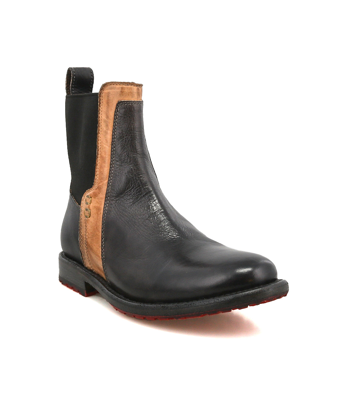 The Ethic by Bed Stu is a black vegetable-tanned leather Chelsea boot featuring brown accents, elastic side panels, a back pull tab, a low heel, and a bold red outsole.