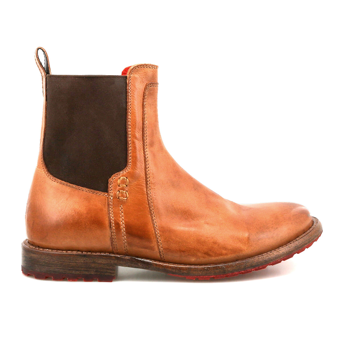 The Bed Stu Ethic is a brown Chelsea boot made from vegetable-tanned leather, with a dark elastic side panel, pull tab, and low heel, displayed in a side view on a white background.