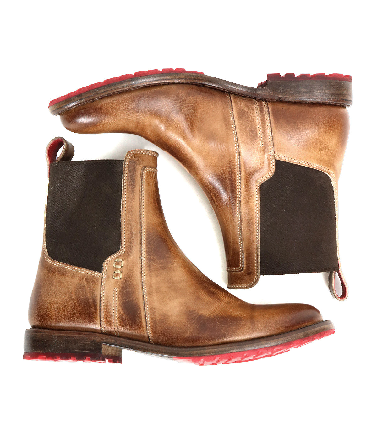 A pair of Ethic Chelsea boots by Bed Stu, crafted from brown vegetable-tanned leather with black elastic side panels and red Vibram soles, displayed side by side on a white background.