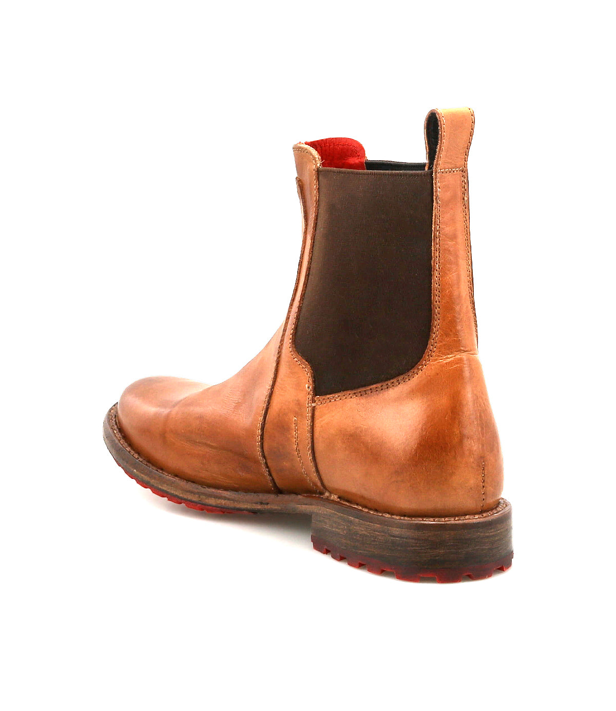 The Bed Stu Ethic is a tan vegetable-tanned leather Chelsea boot with dark elastic side panels, a pull tab, red sole accents, and a stacked wooden heel, shown from the back side angle.