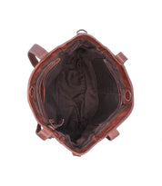 Top view of Bed Stu's Explicit LTC, an open brown leather utility bag featuring a spacious, dark fabric-lined interior and visible stitching.