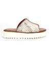 A stylish and comfortable Fairlee II leather slide sandal from Bed Stu, in white and brown.