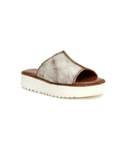 A stylish close up of a Bed Stu Fairlee II leather slide sandal.