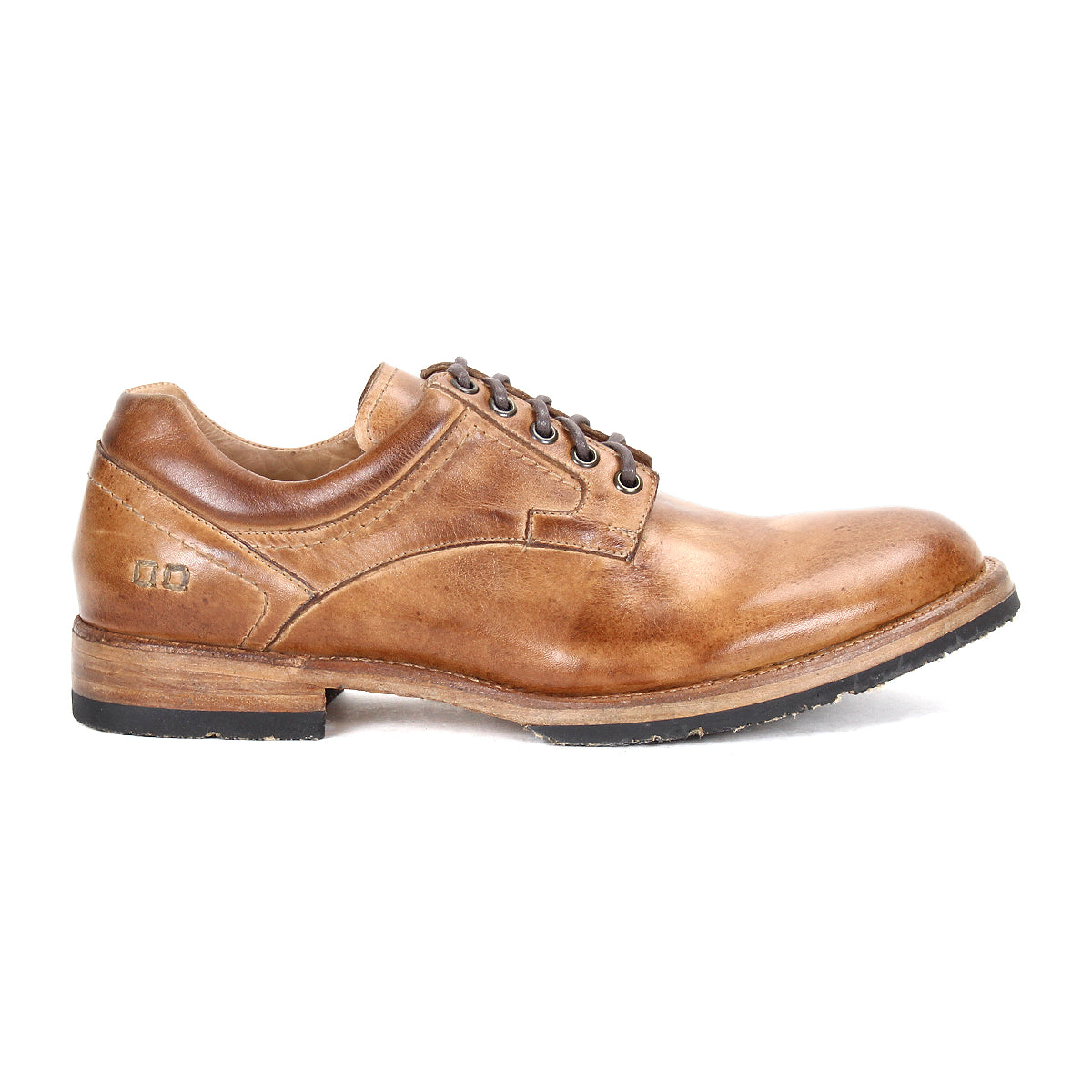 The Bed Stu Fierce is a brown leather men's derby shoe with a modern touch, featuring laces, a low heel, and black sole—shown in side profile against a white background.