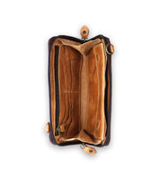 The Flee wallet by Bed Stu, crafted in brown leather, opens to reveal empty compartments along with sections for cards and bills. It features a secure zip closure to keep your essentials safe.