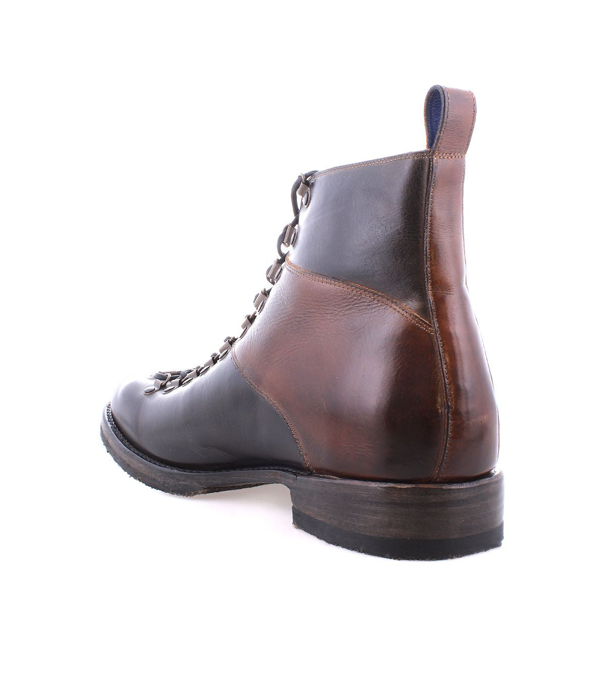 The Frenzy by Bed Stu is a men's hiking boot crafted in brown leather with a dark sole and a lace-up front. It features durable Goodyear welt construction for lasting quality, ideal for adventures, and can be viewed from both the side and back.