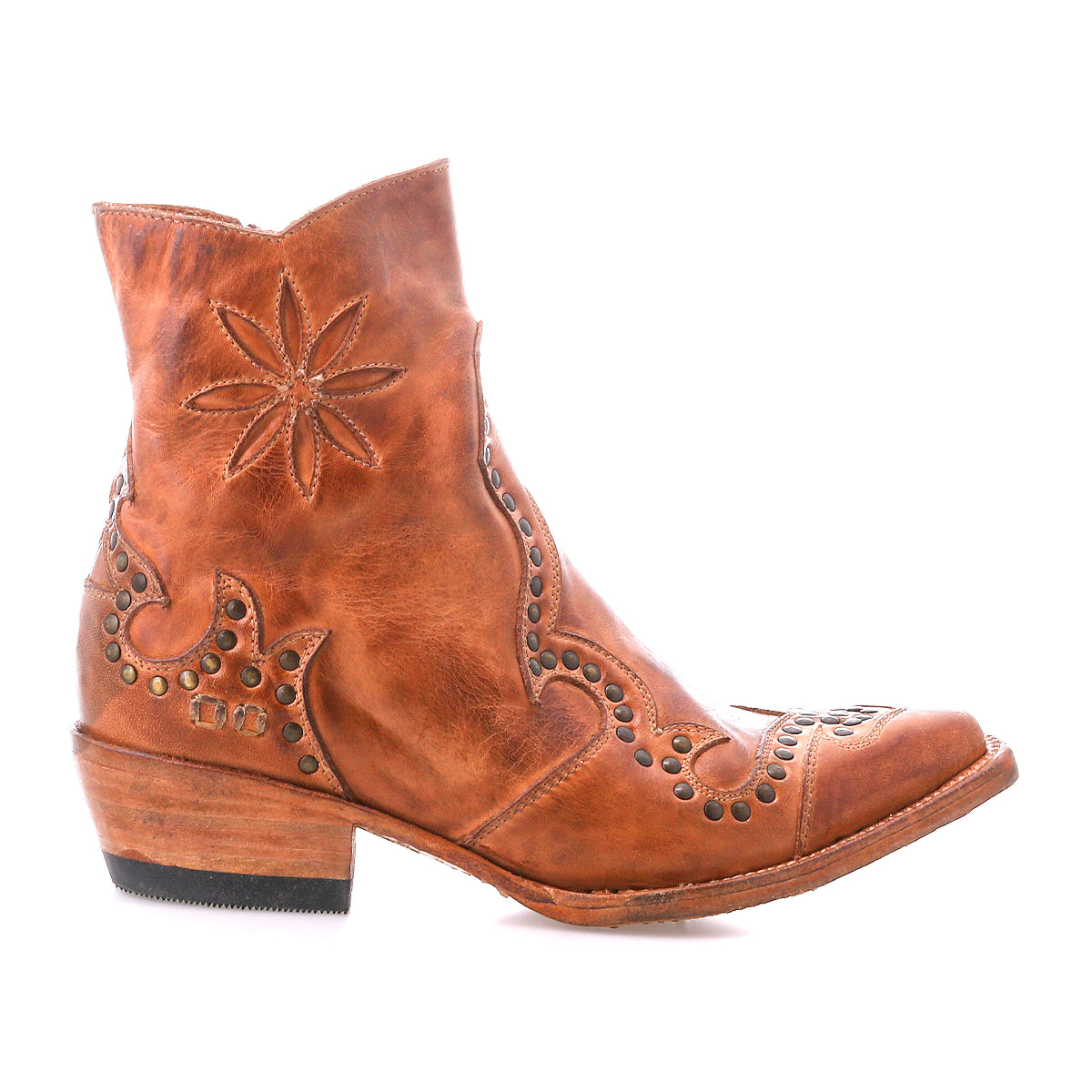The Bed Stu Frio is a brown leather Western bootie with decorative stitching, brass studs, a low heel, and a stylish profile.