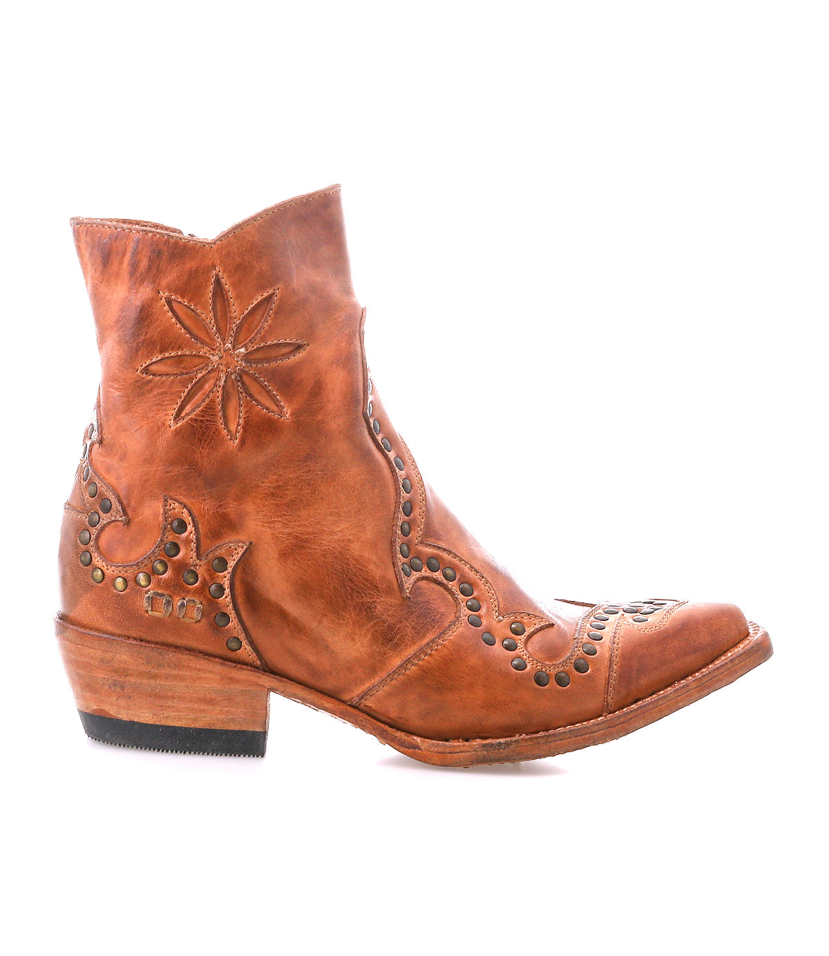 The Bed Stu Frio is a brown leather Western bootie with decorative stitching, brass studs, a low heel, and a stylish profile.