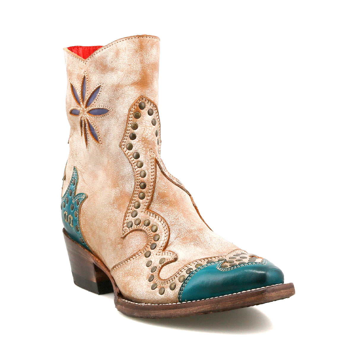 The Bed Stu Frio is a tan and turquoise leather Western bootie featuring decorative stitching, brass studs, a side star detail, floral cutouts, and a low stacked heel.