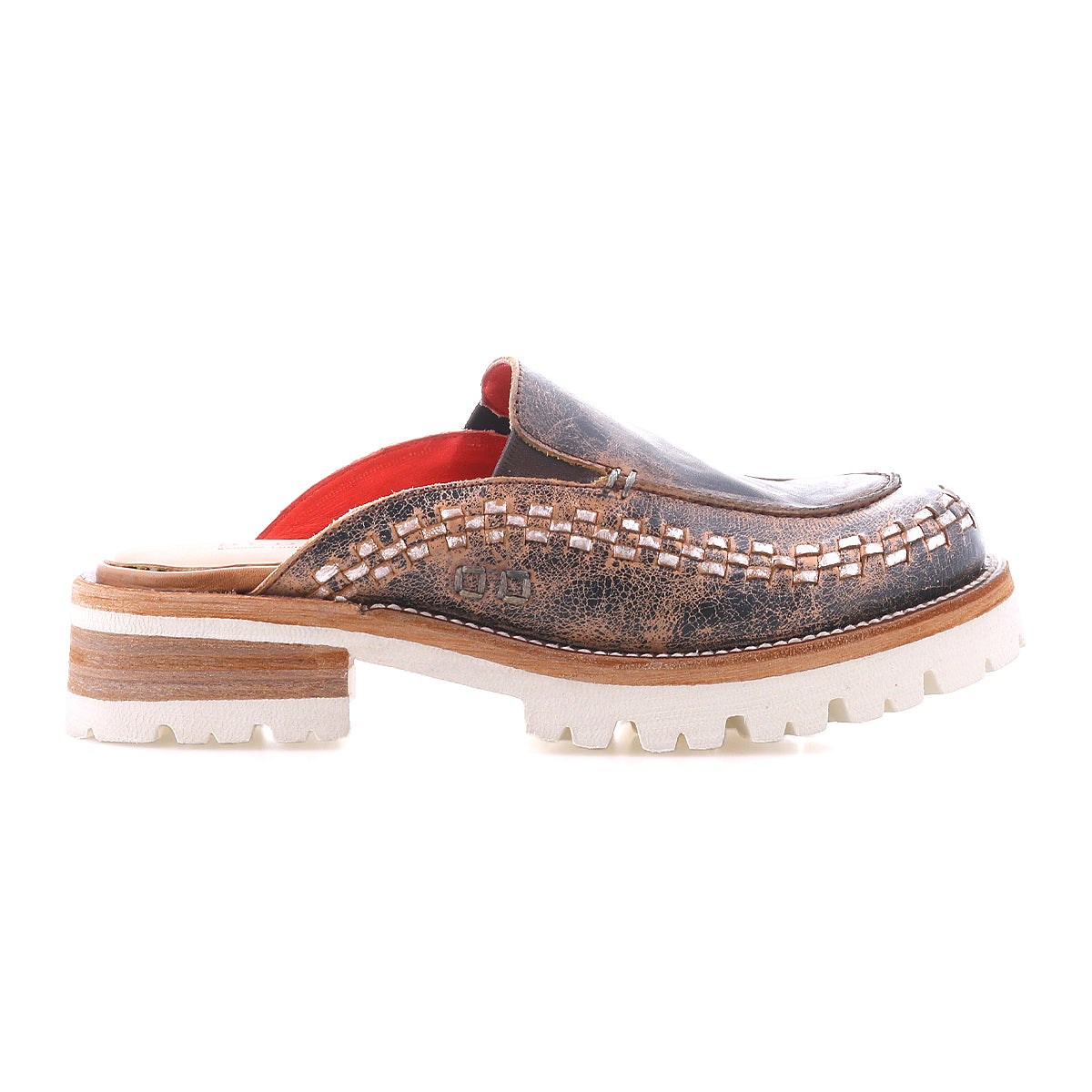 The Bed Stu Fuel is a brown handwoven leather slip-on mule with intricate stitching, a chunky layered sole, lightweight outsole, and red interior lining, shown in side profile.