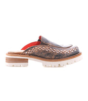 The Bed Stu Fuel is a brown handwoven leather slip-on mule with intricate stitching, a chunky layered sole, lightweight outsole, and red interior lining, shown in side profile.