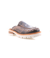 The Bed Stu Fuel is a brown handwoven leather slip-on loafer featuring decorative stitching and a thick white lightweight outsole, shown on a white background.