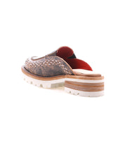 Back view of the Bed Stu Fuel: a brown handwoven leather slip-on mule featuring a chunky layered sole, lightweight outsole with white tread, and red interior lining, shown against a white background.