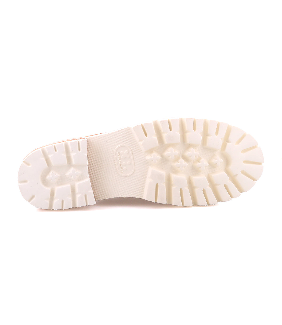 A close-up of the Bed Stu Fuel shoe's white rubber sole, featuring a textured tread pattern and an XL EXTRALIGHT® outsole, viewed from the bottom against a plain white background.