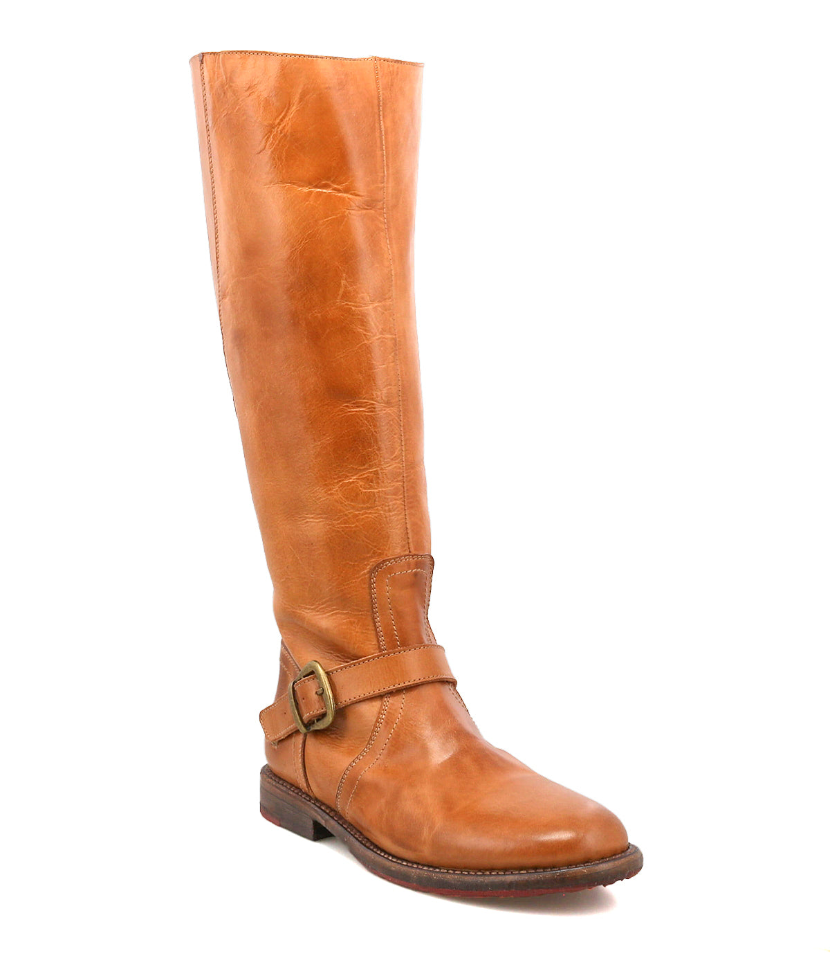 The Bed Stu Glaye is a single tan leather equestrian boot featuring a low heel, round toe, and vintage buckle strap detail, displayed against a plain white background.