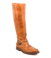 The Bed Stu Glaye is a single tan leather equestrian boot featuring a low heel, round toe, and vintage buckle strap detail, displayed against a plain white background.