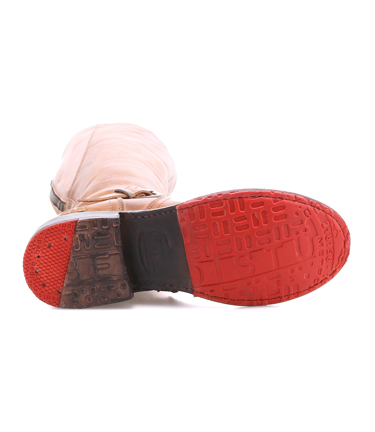 Bed|Stü Glaye Wide Calf tan leather knee-high equestrian boots, showing the red textured rubber sole.