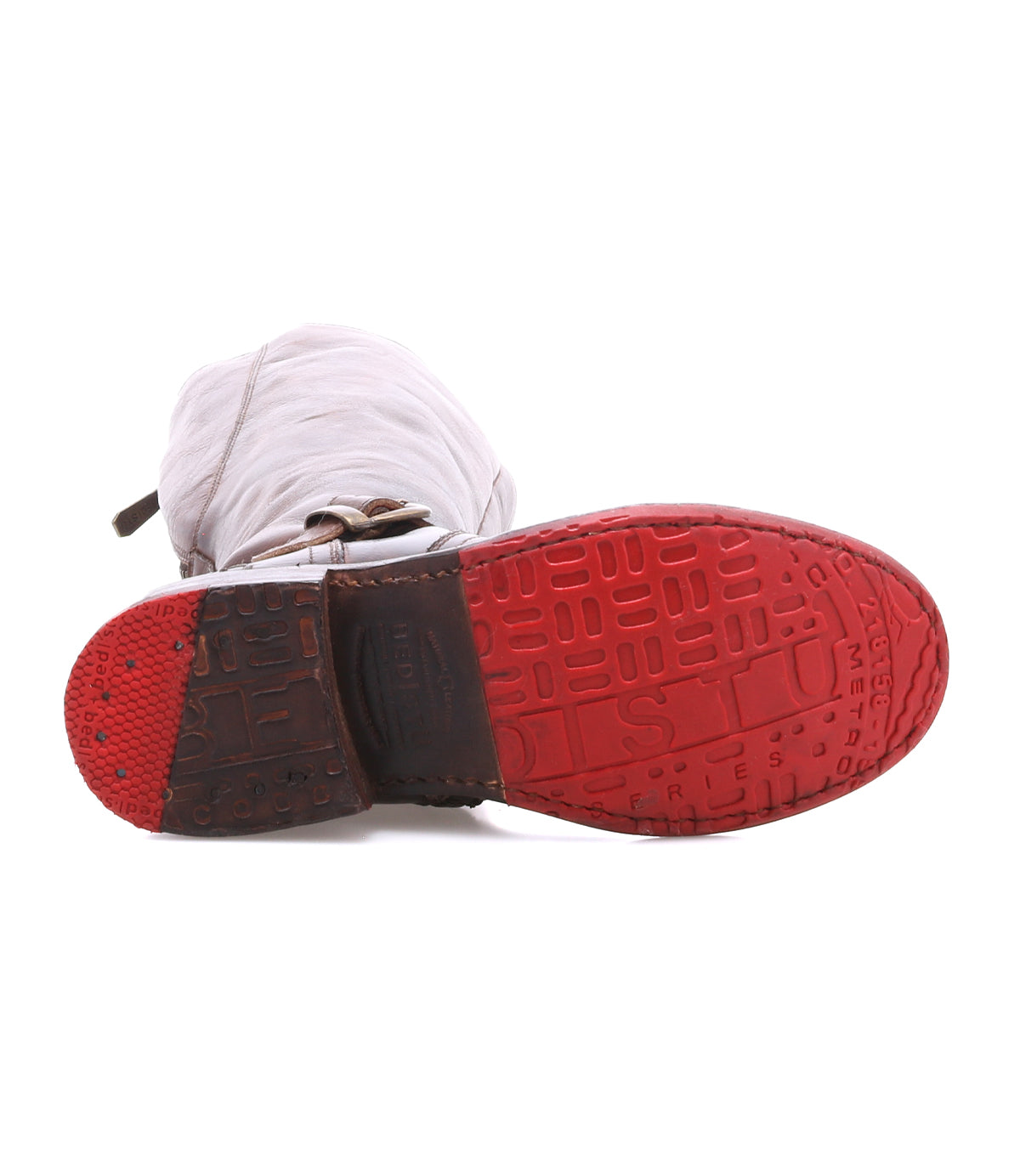 Bottom view of a Glaye Wide Calf equestrian boot with a tall leather shaft and a bright red rubber sole.