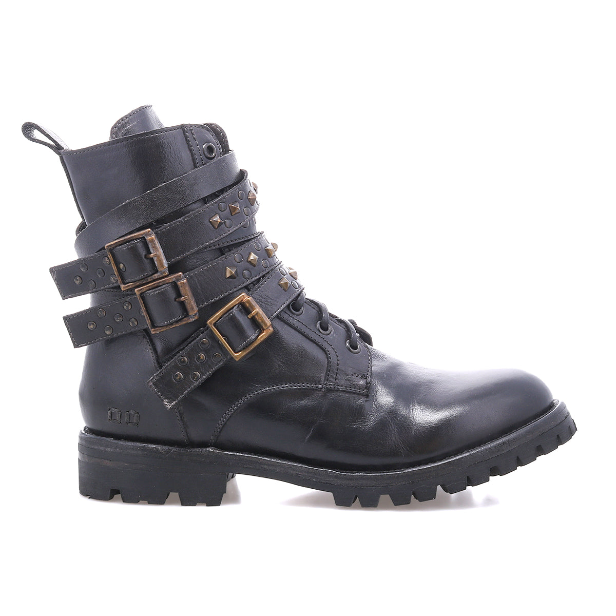 The Bed Stu Grab is a black leather combat-inspired boot with studded buckle straps and metal studs, shown in side profile on a white background. It features a sturdy Vibram rubber lug sole for traction and durability.
