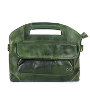 The Bed Stu Greenway is a green leather crossbody bag featuring a front pocket, stitched edges, and a top handle for versatile style.