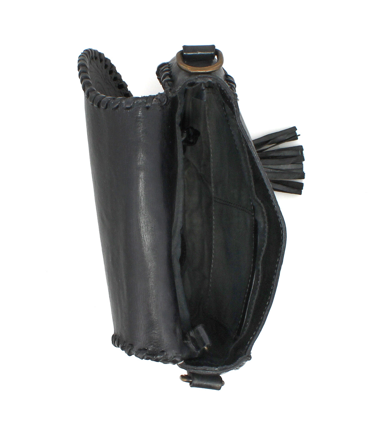 Top view of Bed Stu's Half Moon EM—an empty black leather saddlebag crossbody with visible stitching, an open compartment, side leather tassel detail, and a subtle embossed foliage pattern.