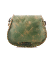 The Bed Stu Half Moon is a small, green leather crossbody purse featuring visible edge stitching and an adjustable strap, shown against a white background.