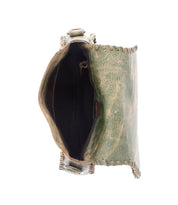 Top view of the Bed Stu Half Moon crossbody purse in greenish leather with brown edge stitching, featuring an open design and a dark interior compartment.