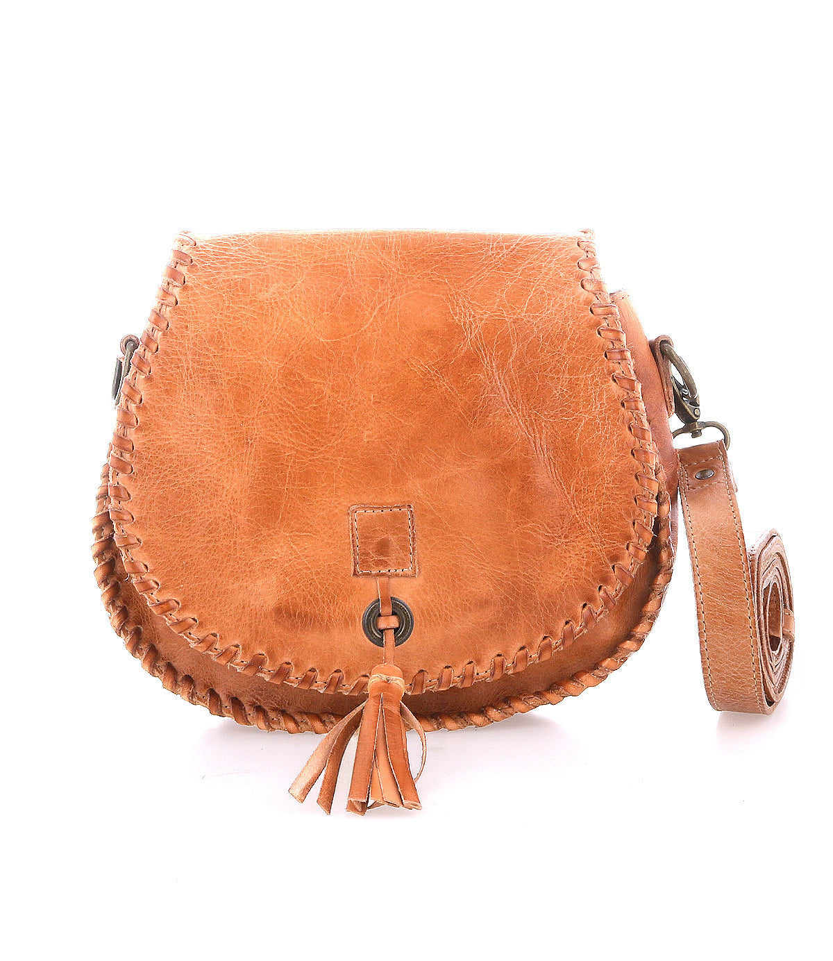 The Bed Stu Half Moon is a tan leather crossbody purse with a stitched border, leather tassel on the front, and adjustable strap, shown on a white background.