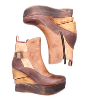 Bed Stu's Harmonious brown Platform Wedge Ankle Boots feature buckle detail, a leather interior, and a sculptural wood wedge. Shown stacked to display both outer and inner sides.