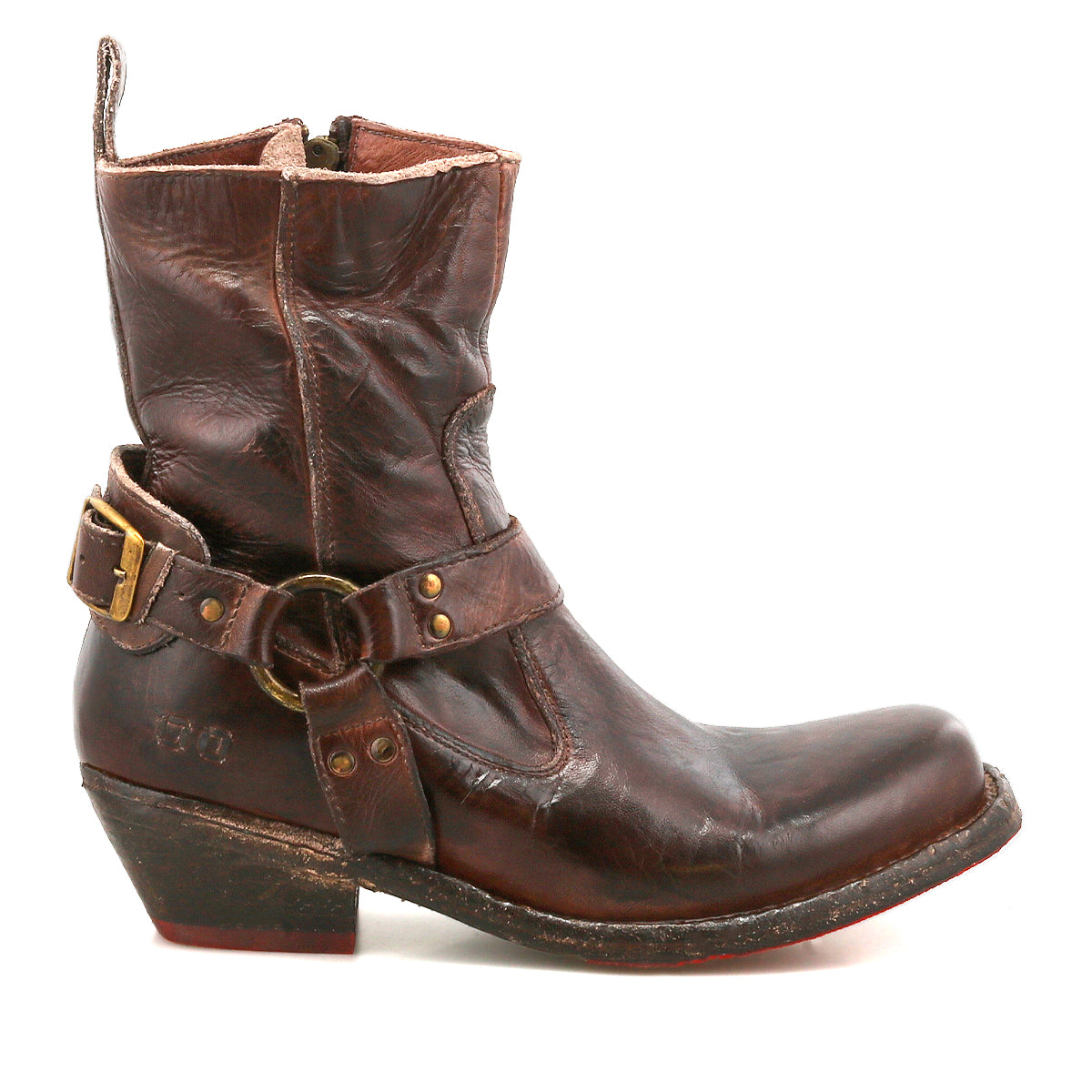 The Bed Stu Homage is a rugged men's fashion boot crafted from worn brown leather, featuring a low heel, decorative strap with brass buckle, side zipper, and square toe—perfect for adding standout style to any collection.