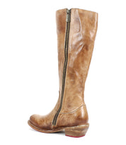 The Bed Stu "Humble" is a tall brown leather boot with a square toe, side zipper, low stacked heel, and slightly worn texture—an ideal choice to elevate your fall-winter boots collection.