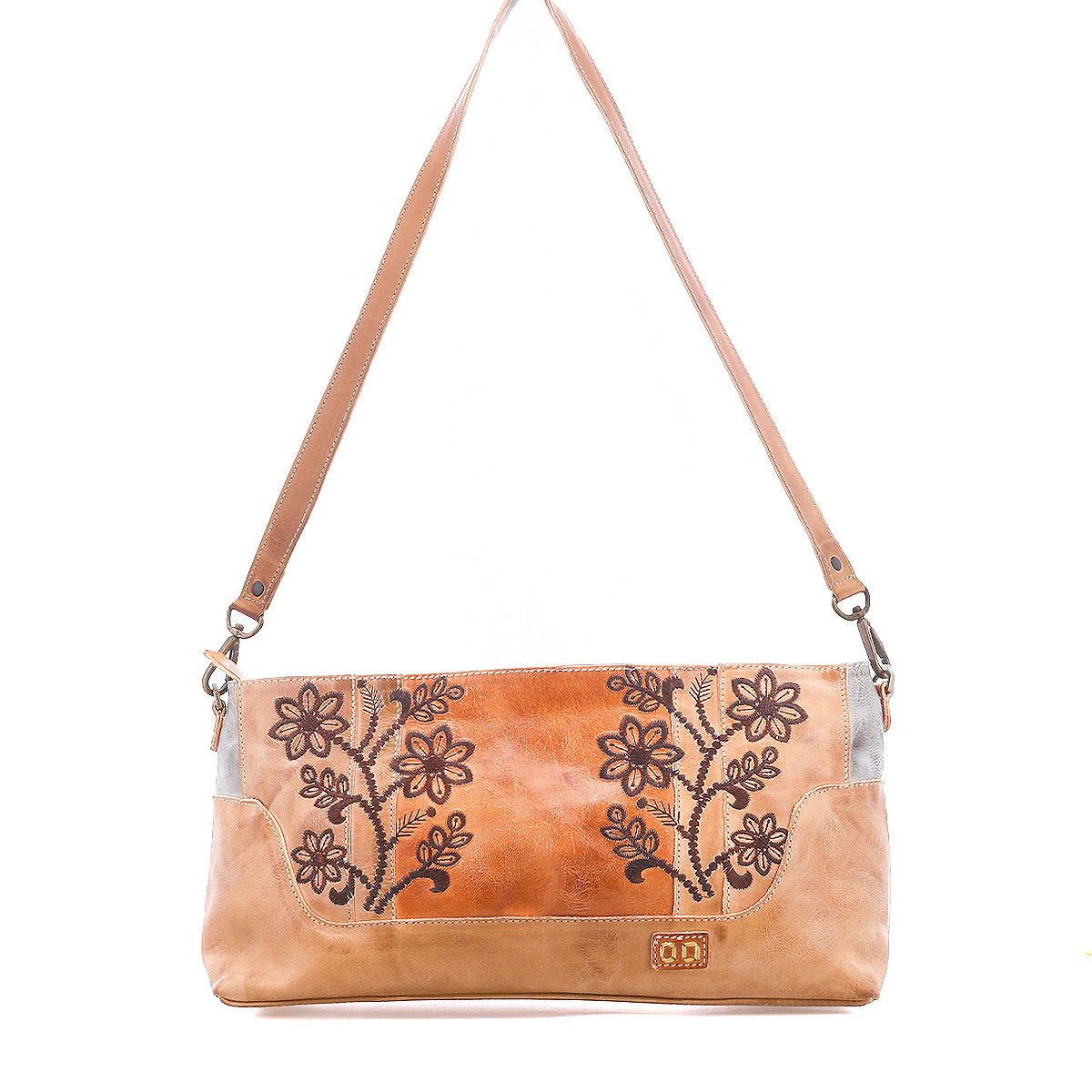 The Bed Stu Hyperbolic is a tan leather shoulder bag with floral embroidery, a single strap, and handcrafted boho details, photographed on a white background.
