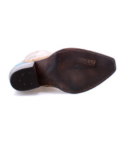 A pair of Hyperspeed handcrafted brown shoes with blue soles on a white background by Bed Stu.