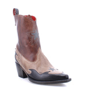 A Hyperspeed women's handcrafted leather boot with a star on the side by Bed Stu.