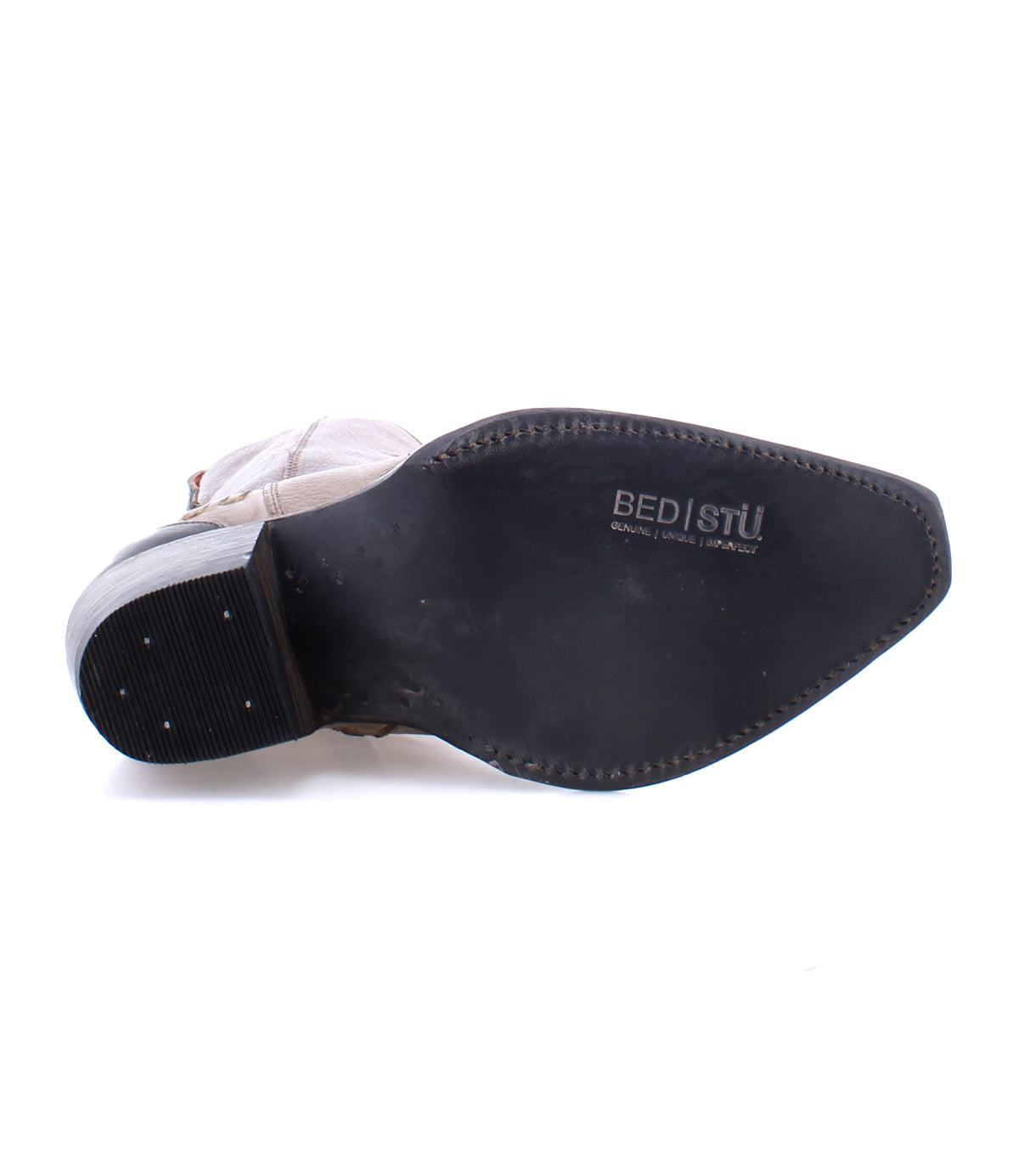 A Bed Stu Hyperspeed with black soles on a white background.