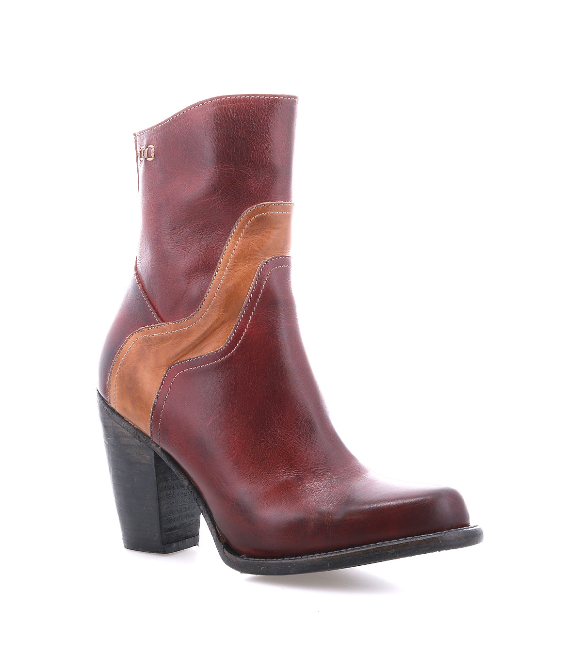 The Bed Stu Iazu is a handcrafted leather boot in brown and tan, featuring a chunky stacked heel, decorative stitching, and a square toe, shown against a white background.