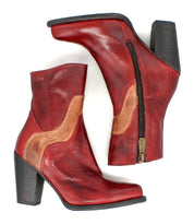 The Bed Stu Iazu ankle boots in red and tan handcrafted leather feature side zippers, chunky stacked heels, and a modern square toe, shown side by side on a white background.