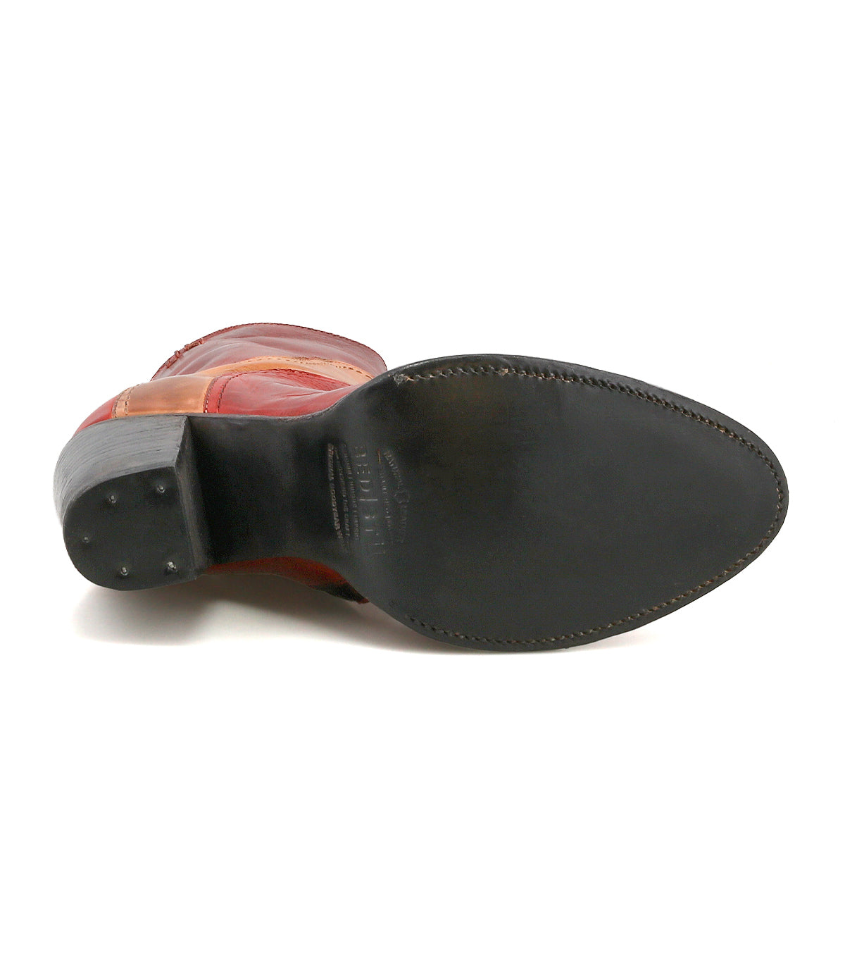 The image shows the underside of the Bed Stu Iazu, a handcrafted leather boot featuring a smooth black sole and a stacked heel.