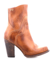 The Bed Stu Iazu boot, shown in side profile against a white background, features handcrafted brown leather, a high chunky stacked heel, square toe, and decorative stitching.