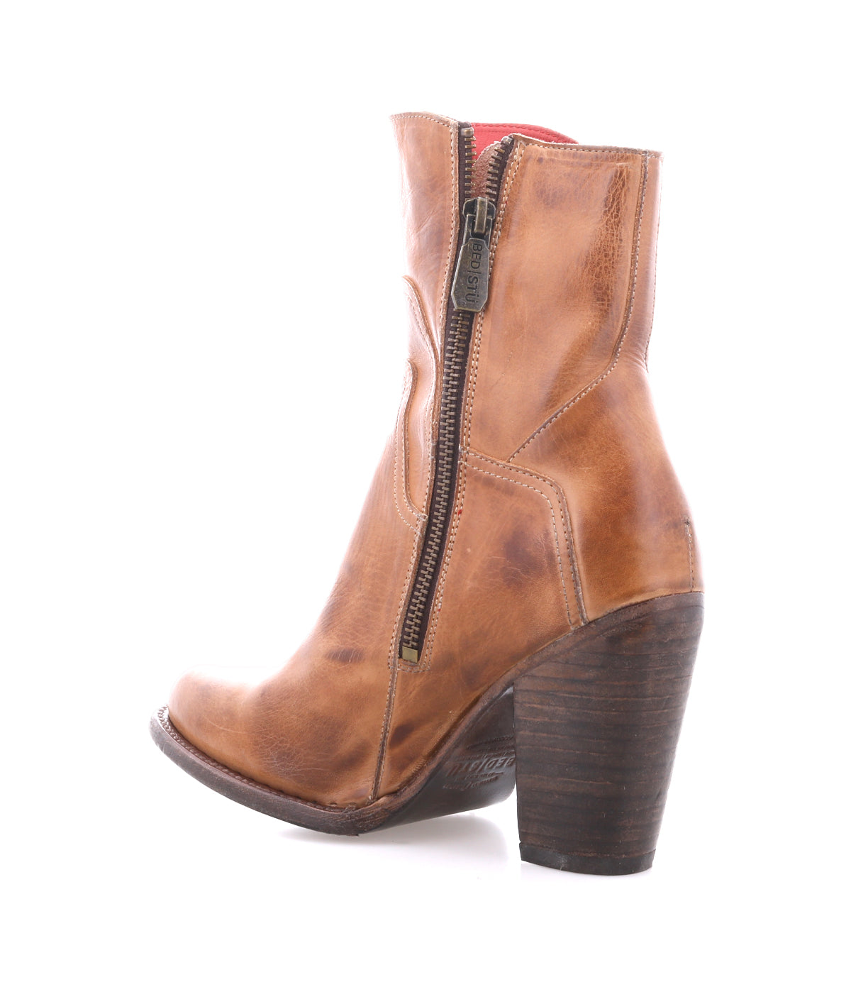 The Bed Stu Iazu is a brown handcrafted leather ankle boot featuring a square toe, side zipper, and chunky high heel, shown on a white background.
