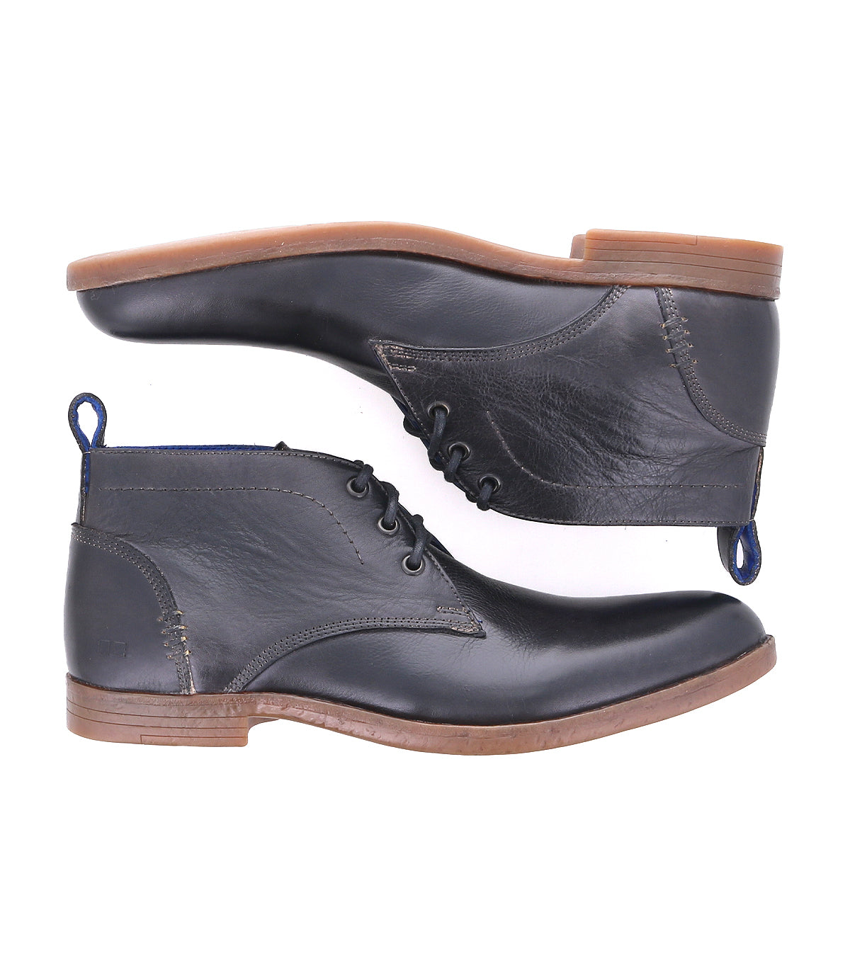 A pair of black vegetable-tanned leather Bed Stu Illiad men's dress shoes with blue pull tabs and laces, displayed against a white background.