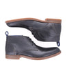 A pair of Bed Stu Illiad black leather chukka boots made with natural materials.