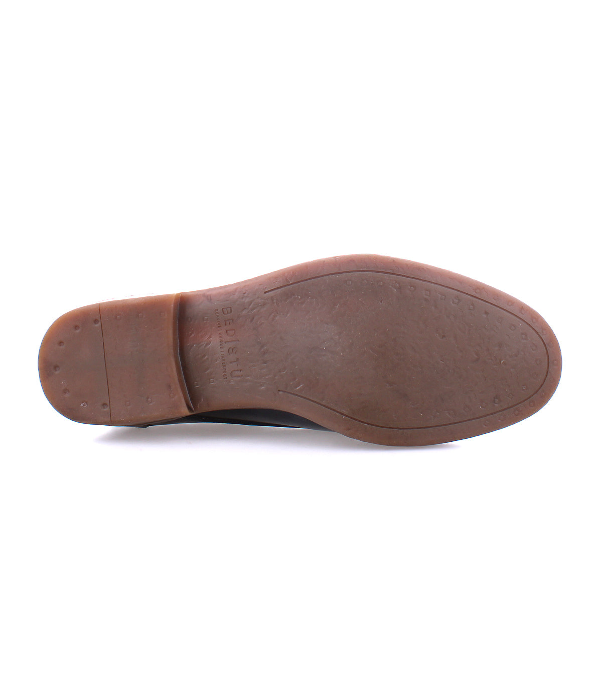 Sole of a brown leather chukka boot with textured grip and Bed Stu imprint visible, isolated on a white background.